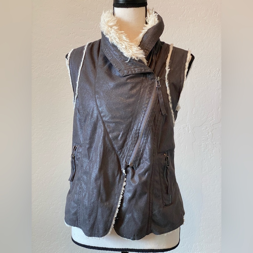 Faux fur asymmetric vest